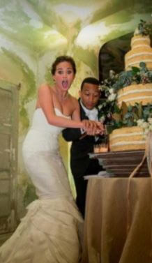 Phyllis Stephens brother John Legend and sister-in-law cutting the wedding cake.